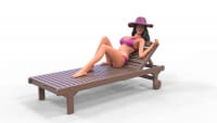 Woman sunbathing on loungers